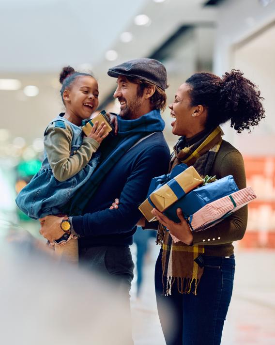 multiracial family shopping for the holidays