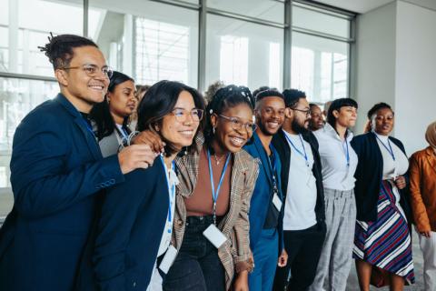 happy employees with badges